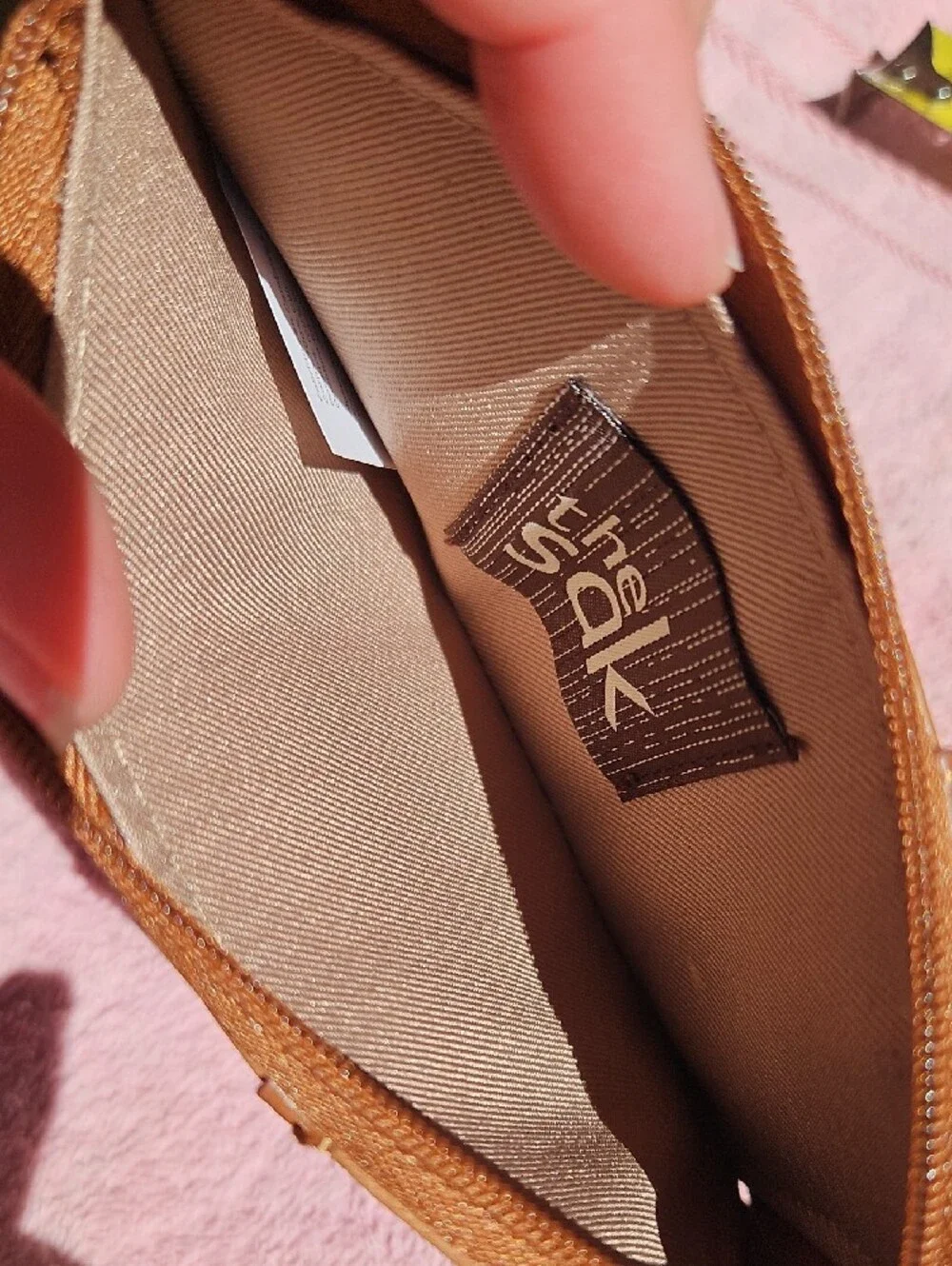 The Sak Brown Embossed Leather Zip Card Holder with Key Ring